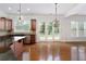 Well-designed kitchen features a large island, stainless steel appliances, and backyard access at 4652 Prater Se Way, Smyrna, GA 30080