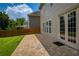 Outdoor patio featuring pavers and access to lush backyard at 4652 Prater Se Way, Smyrna, GA 30080