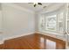 A versatile room features hardwood floors, neutral walls, and built-in window seat at 4652 Prater Se Way, Smyrna, GA 30080