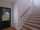 Entryway with view of new home through glass front door and staircase at 553 Somersby Dr, Dallas, GA 30157