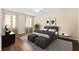 Cozy bedroom with large windows and neutral decor at 98 Hampshire Ct, Avondale Estates, GA 30002