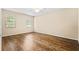 Bright bedroom with wood-look flooring and great natural light at 98 Hampshire Ct, Avondale Estates, GA 30002