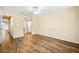 Spacious bedroom featuring wood floors, ceiling fan, and closet at 98 Hampshire Ct, Avondale Estates, GA 30002