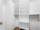 Walk-in closet with ample shelving and storage space at 98 Hampshire Ct, Avondale Estates, GA 30002