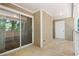 Outdoor patio with sliding glass door and storage closet at 98 Hampshire Ct, Avondale Estates, GA 30002