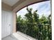 Balcony with black railings overlooking lush greenery at 1850 Cotillion Dr # 2416, Atlanta, GA 30338