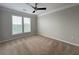 Bedroom features a ceiling fan and a window to let in plenty of natural light at 1850 Cotillion Dr # 2416, Atlanta, GA 30338