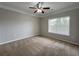 Neutral bedroom with natural light, crown molding, ceiling fan, and carpeted flooring at 1850 Cotillion Dr # 2416, Atlanta, GA 30338
