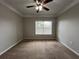 Bedroom features a ceiling fan and a window to let in plenty of natural light at 1850 Cotillion Dr # 2416, Atlanta, GA 30338
