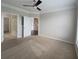 Spacious bedroom features a view to the stairway and a bathroom at 1850 Cotillion Dr # 2416, Atlanta, GA 30338