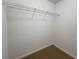 Walk-in closet with carpet flooring and wire shelving at 1850 Cotillion Dr # 2416, Atlanta, GA 30338