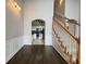 Inviting entryway with a hardwood floor, adjacent to an open kitchen and stairway at 1850 Cotillion Dr # 2416, Atlanta, GA 30338
