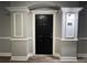 Elegant front door with decorative trim and unit number display at 1850 Cotillion Dr # 2416, Atlanta, GA 30338