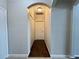 Hallway with arched ceiling and hardwood floors at 1850 Cotillion Dr # 2416, Atlanta, GA 30338