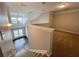 View from stairs to living room with hardwood floors and vaulted ceilings at 1850 Cotillion Dr # 2416, Atlanta, GA 30338
