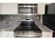 Kitchen close up featuring stainless steel appliances and granite countertops at 1850 Cotillion Dr # 2416, Atlanta, GA 30338