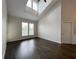 Bright living room featuring hardwood floors, and natural light from transom windows at 1850 Cotillion Dr # 2416, Atlanta, GA 30338