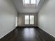 Bright living room featuring hardwood floors, an outdoor access, and natural light at 1850 Cotillion Dr # 2416, Atlanta, GA 30338