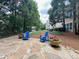 Cozy patio area with comfortable seating amidst lush greenery at 1850 Cotillion Dr # 2416, Atlanta, GA 30338