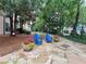 A relaxing patio with charming blue Adirondack chairs at 1850 Cotillion Dr # 2416, Atlanta, GA 30338