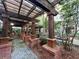 Charming pergola-covered path with brick columns amidst lush community landscaping at 1850 Cotillion Dr # 2416, Atlanta, GA 30338