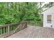 The back deck overlooks lush greenery and offers plenty of outdoor living space at 2122 Rockland Ct, Marietta, GA 30062