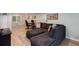Finished basement with a comfortable seating area, an open floorplan, and an adjacent office area at 2122 Rockland Ct, Marietta, GA 30062