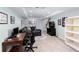 This finished basement features an open floorplan with a seating area and home office at 2122 Rockland Ct, Marietta, GA 30062