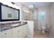 Bathroom featuring a granite countertop vanity and a glass-enclosed shower at 2122 Rockland Ct, Marietta, GA 30062
