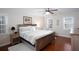 Bedroom with hardwood floors, neutral walls, and large windows at 2122 Rockland Ct, Marietta, GA 30062