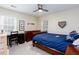 Bedroom featuring a full sized bed with desk and decor at 2122 Rockland Ct, Marietta, GA 30062