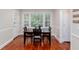 Cozy breakfast nook with a large window, hardwood floors, and ample natural light at 2122 Rockland Ct, Marietta, GA 30062
