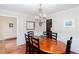 Elegant dining room with hardwood floors and a view to the living room at 2122 Rockland Ct, Marietta, GA 30062