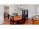 Formal dining room with hardwood floors, elegant chandelier, and classic wainscoting at 2122 Rockland Ct, Marietta, GA 30062