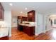 Expansive kitchen with a center island, granite countertops, and hardwood floors at 2122 Rockland Ct, Marietta, GA 30062