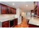 Updated kitchen with stainless steel appliances, granite countertops, and wine storage at 2122 Rockland Ct, Marietta, GA 30062