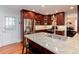Well-equipped kitchen with granite counters, stainless appliances, and cherry wood cabinets at 2122 Rockland Ct, Marietta, GA 30062