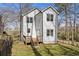 Backyard view with fence, small deck and grassy area at 2453 Paul Nw Ave, Atlanta, GA 30318