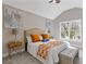 Bedroom featuring a queen bed, vaulted ceiling, ample natural light, and stylish decor at 2453 Paul Nw Ave, Atlanta, GA 30318