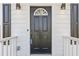 Close-up of the home's front door, sidelights, and black hardware at 2453 Paul Nw Ave, Atlanta, GA 30318