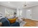 Bright living room features hardwood floors, modern lighting, and stylish furniture at 2453 Paul Nw Ave, Atlanta, GA 30318