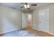 Bedroom with neutral walls and carpeting, and two white doors at 4085 Fawn Valley Dr, Loganville, GA 30052
