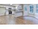 Kitchen features white cabinets, granite countertops, and stainless steel appliances at 4085 Fawn Valley Dr, Loganville, GA 30052