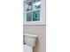 Toilet in bathroom with window view to the exterior at 4085 Fawn Valley Dr, Loganville, GA 30052
