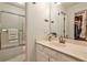 Bathroom with shower/tub, neutral walls, and a sink next to a linen closet at 1750 Clairmont Rd # 35, Decatur, GA 30033