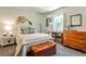 Cozy bedroom with natural light, white shutters, and a decorative fan at 1750 Clairmont Rd # 35, Decatur, GA 30033