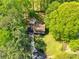 High aerial view of a beautiful home nestled in a lush green environment at 3719 Northbrook Ct, Atlanta, GA 30340