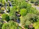 Stunning aerial view of a secluded home surrounded by lush trees and greenery in a private neighborhood at 3719 Northbrook Ct, Atlanta, GA 30340