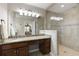Bathroom featuring granite countertops, a glass shower, and neutral tile at 3719 Northbrook Ct, Atlanta, GA 30340