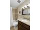 Updated bathroom with granite countertops, tile shower, and stylish fixtures at 3719 Northbrook Ct, Atlanta, GA 30340